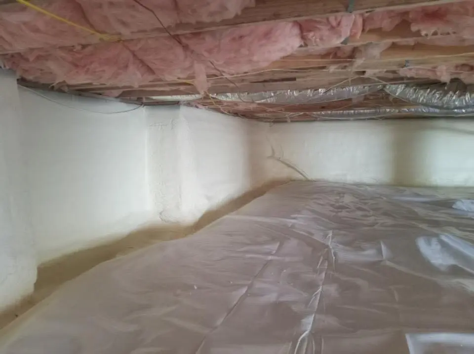 Crawl space encapsulation with closed-cell spray foam for Commercial Roof Restoration in Johnson City